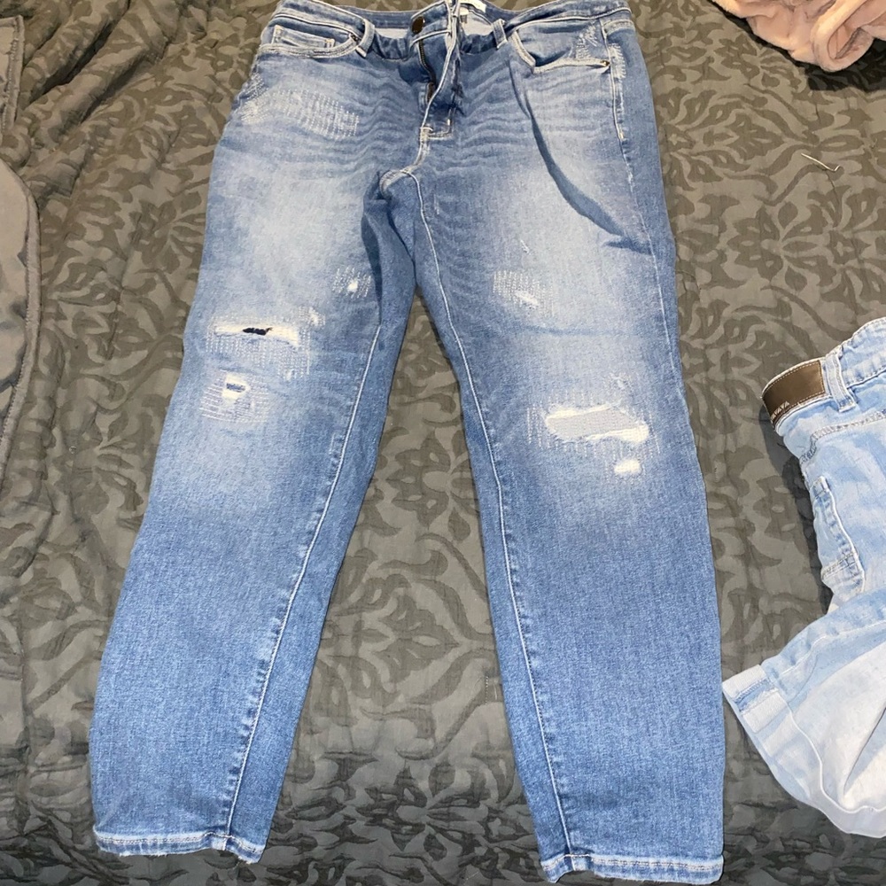 Lane Bryant skinny jeans with patched holes. Size 18.